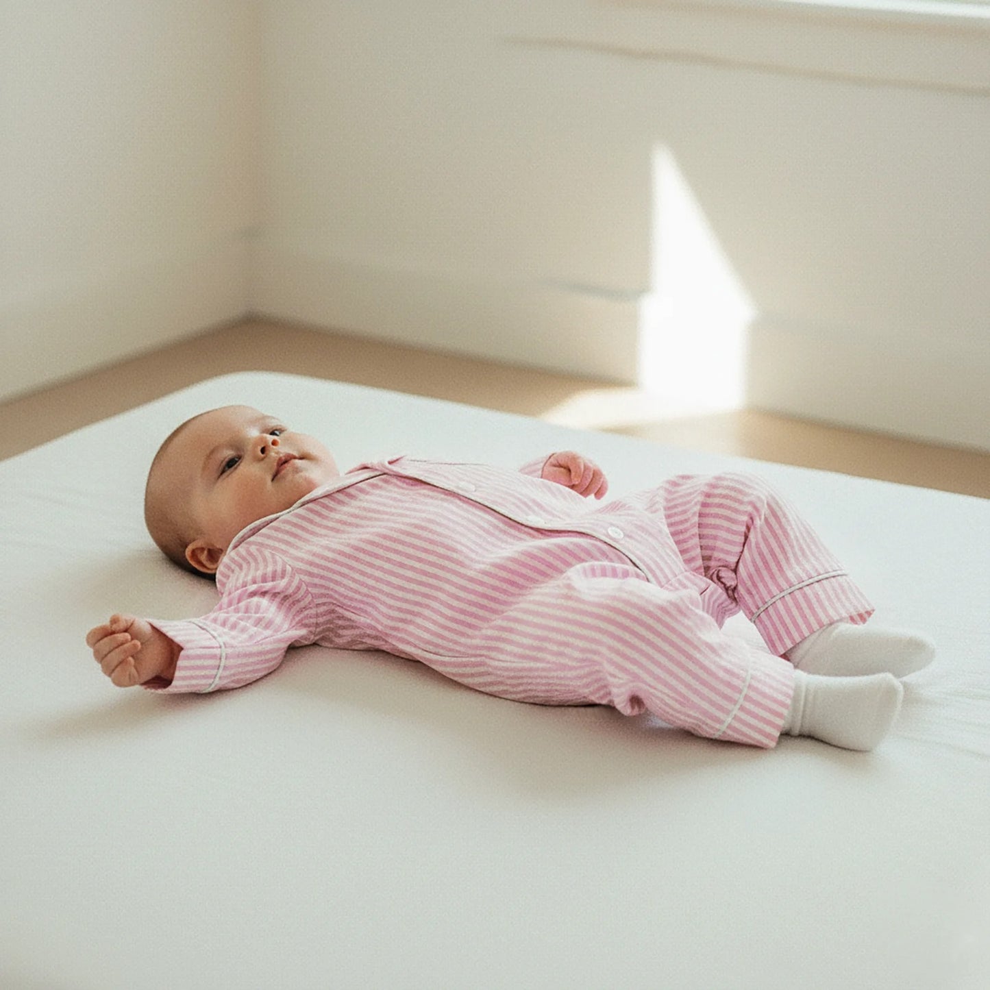 StripeSnug – Baby Striped Button Pajama Romper